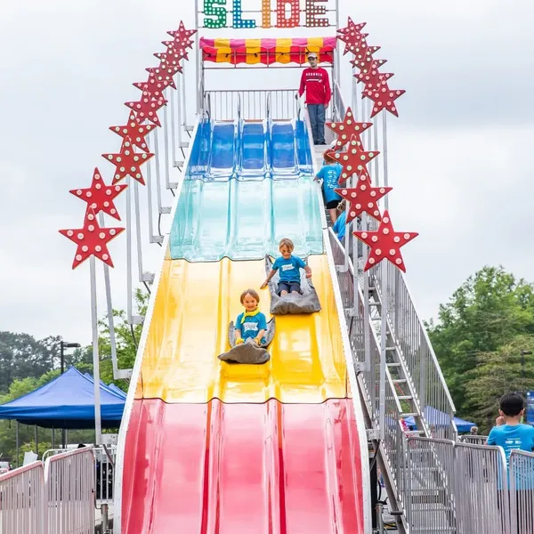 Giant inflatable dry slide at a community event