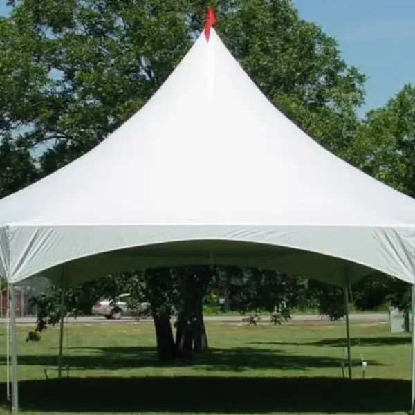 Event tent setup with tables and chairs for outdoor parties